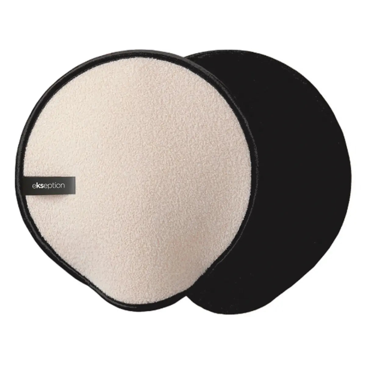 Beige och svart handske med textur, stående på ljus bakgrund – en peelinghandske som tar bort döda hudceller och förbereder huden för självbruning.