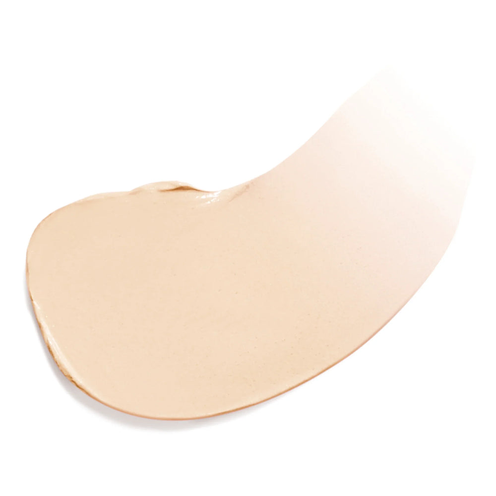 Färgad fuktighetskräm i nyansen Light, vit bakgrund.