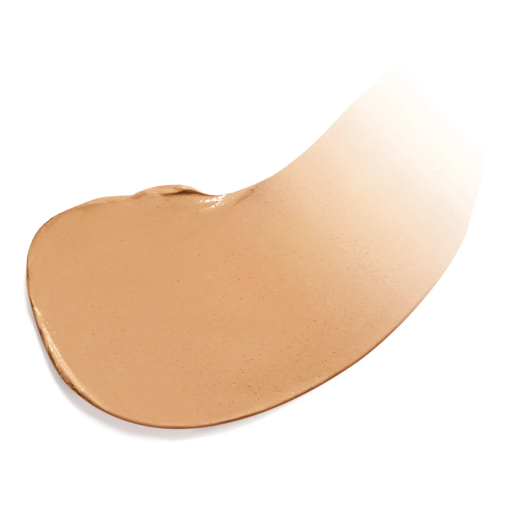 Färgad fuktighetskräm i nyansen Warm Bronze, vit bakgrund.