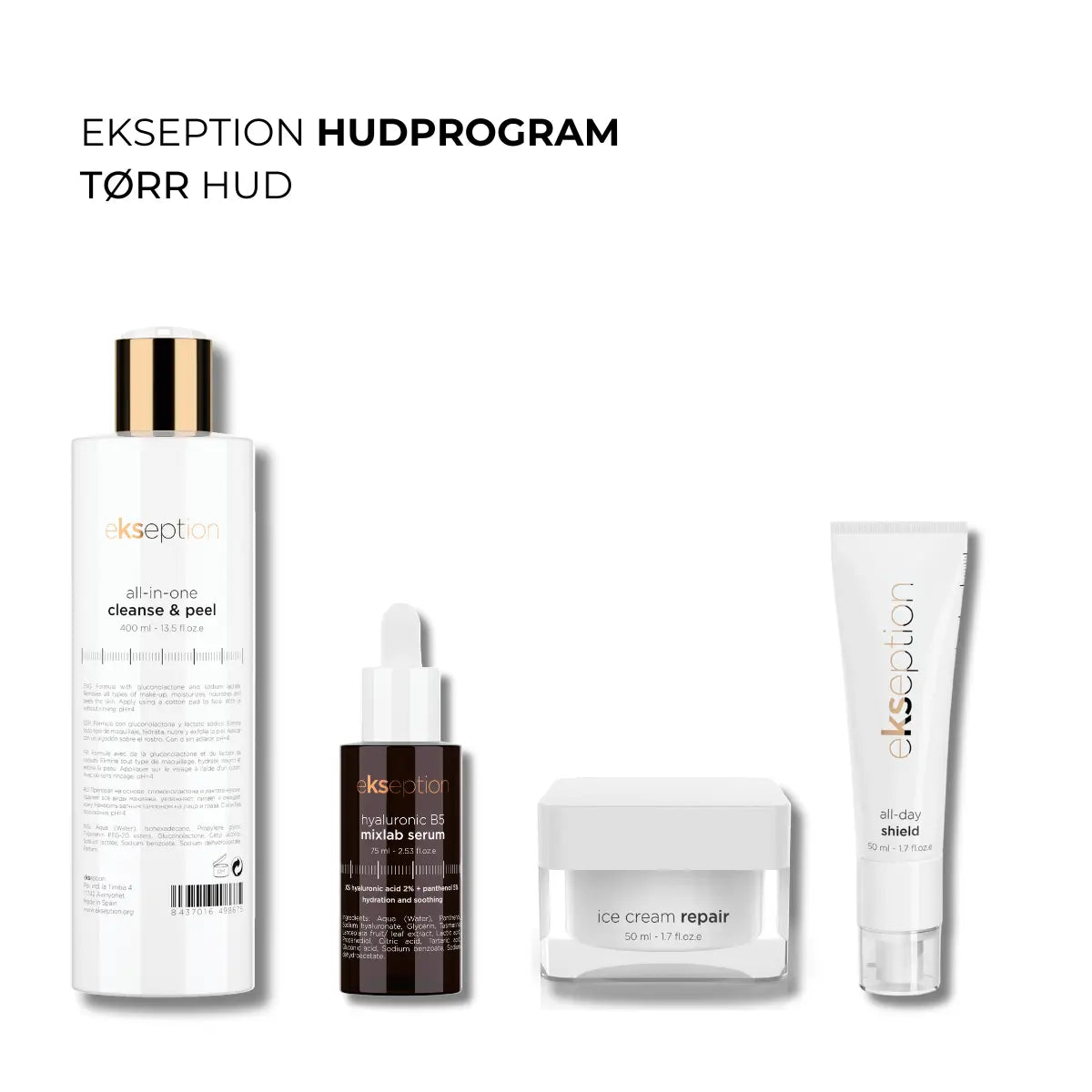 Fyra hudvårdsprodukter i vita förpackningar med svart text, stående i vinkel på ljus bakgrund – hudprogram för torr hud.