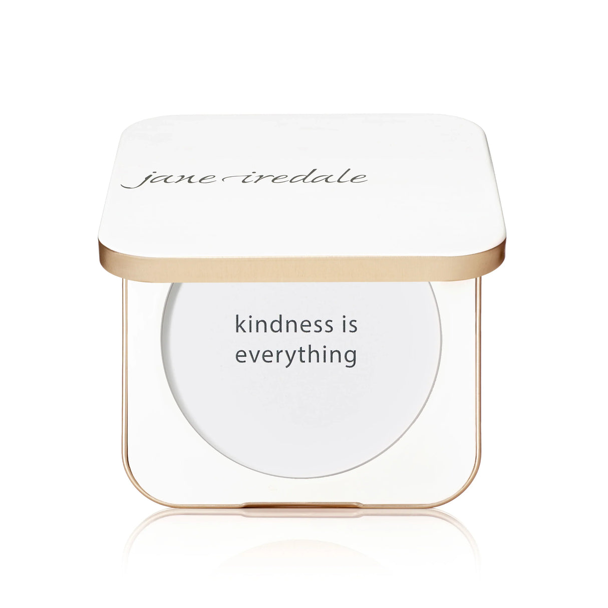 Visar ett återanvändbart fodral i ljus plast med rund form. Insidan har en spegel för enkel användning.